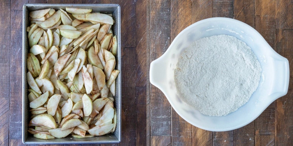 apples over crust in a baking pan