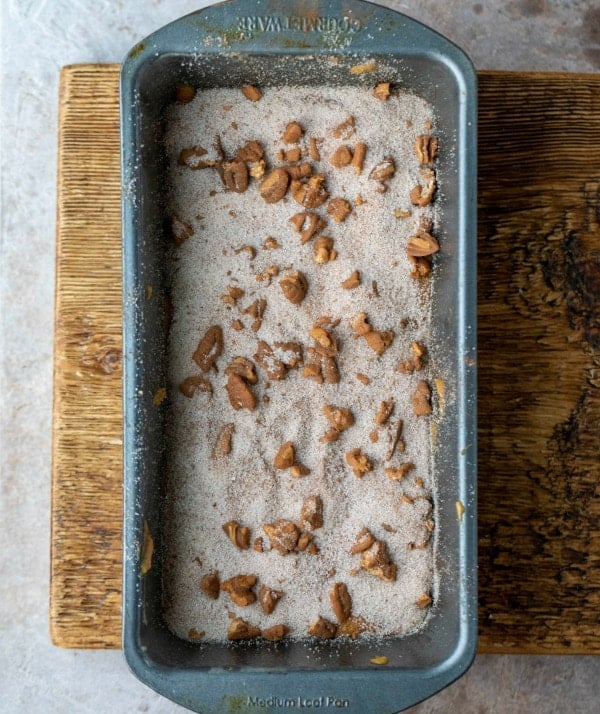 Cinnamon sugar pumpkin bread batter in a metal baking pan