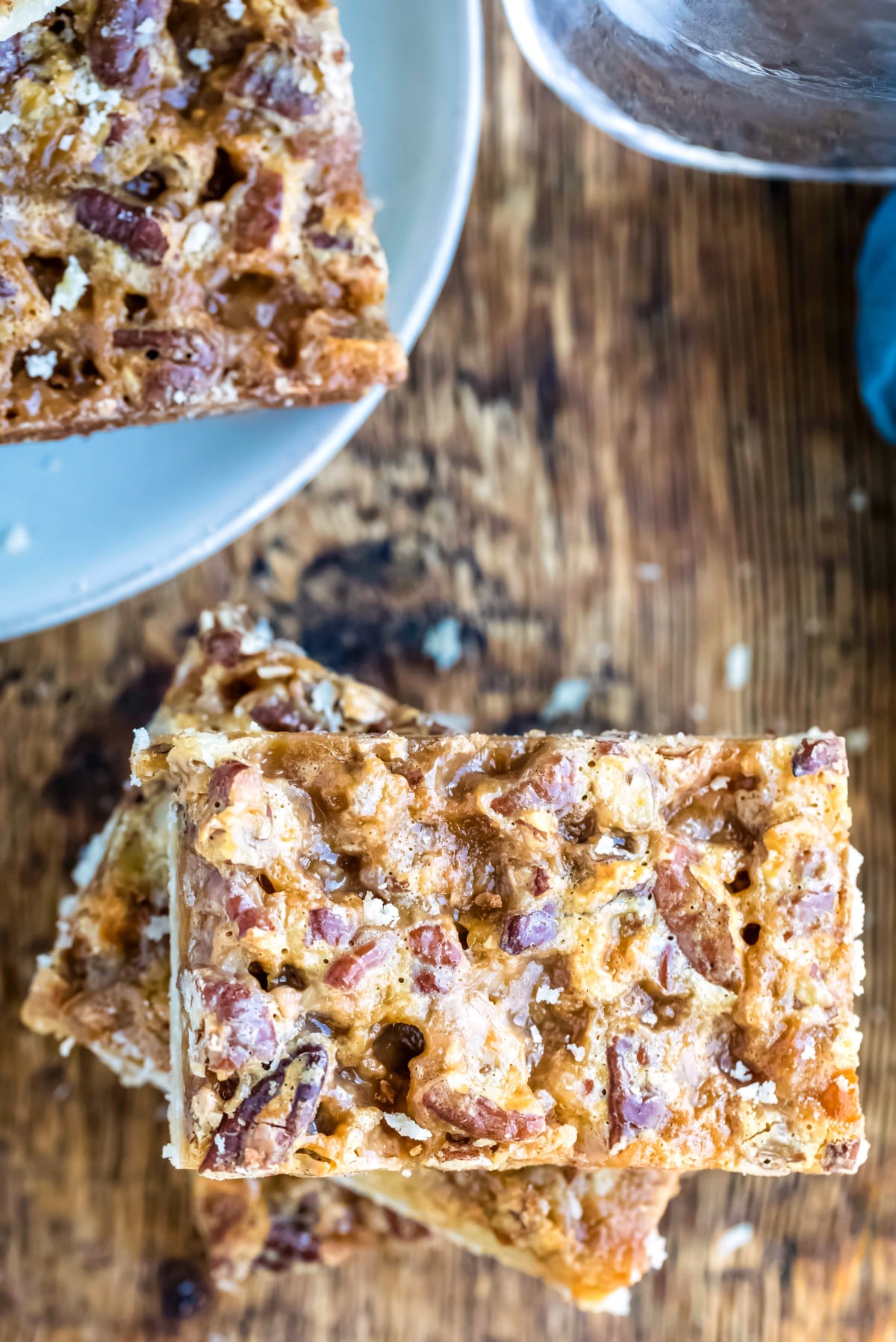 Overhead view of stacked toffee pecan pie bars