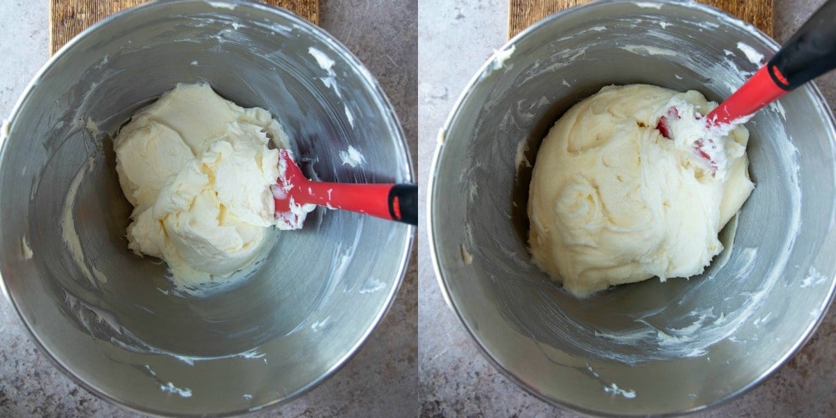 Beaten butter and cream cheese in a silver mixing bowl