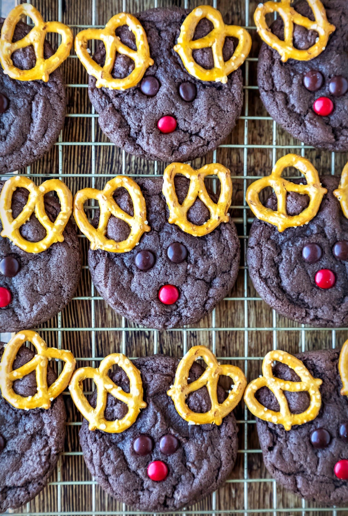 Reindeer cookies on a gold wire baking rack