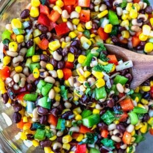 A wooden spoon scooping up cowboy caviar