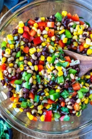 A wooden spoon scooping up cowboy caviar