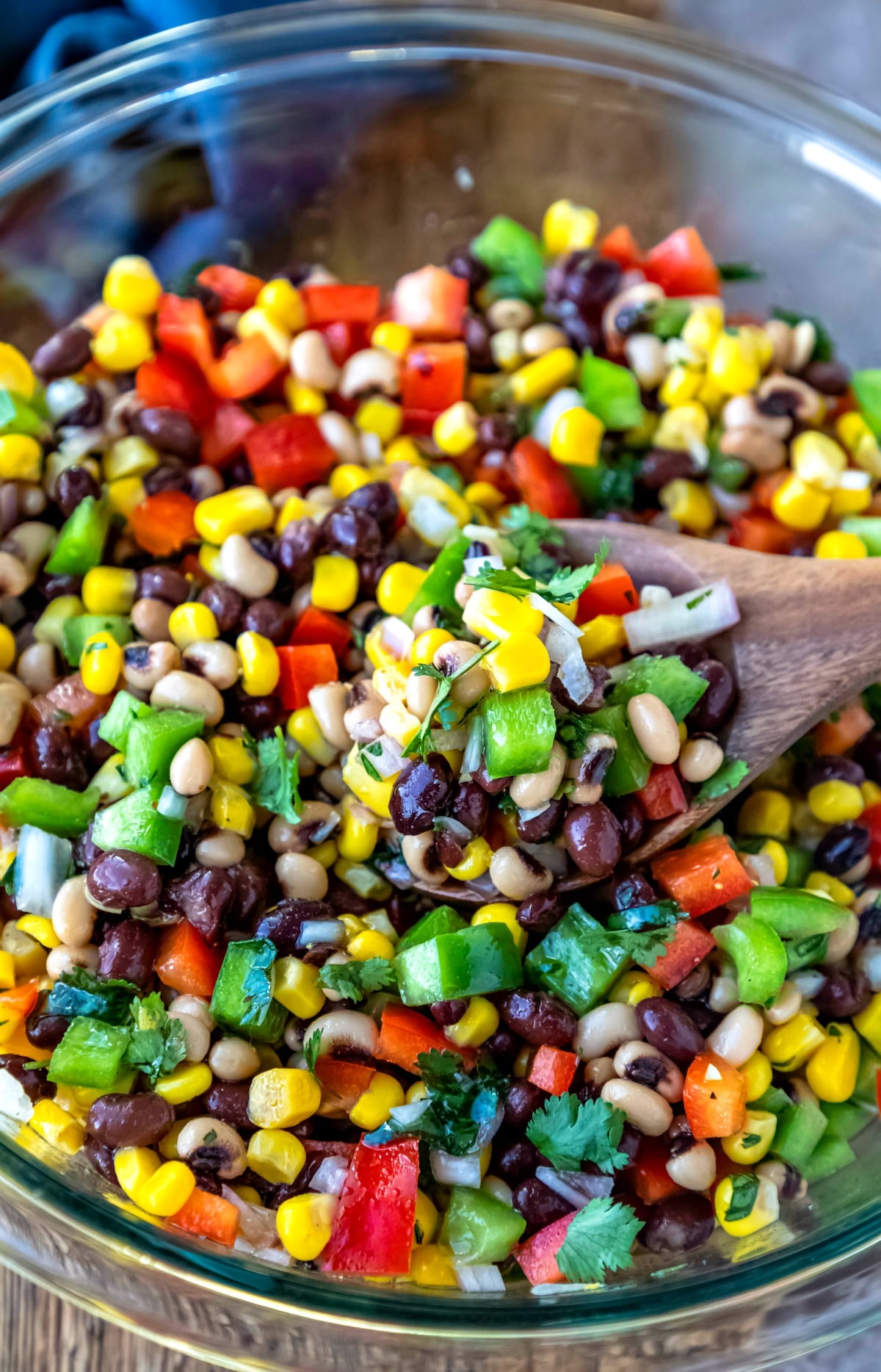 Glass mixing bowl with cowboy caviar in it
