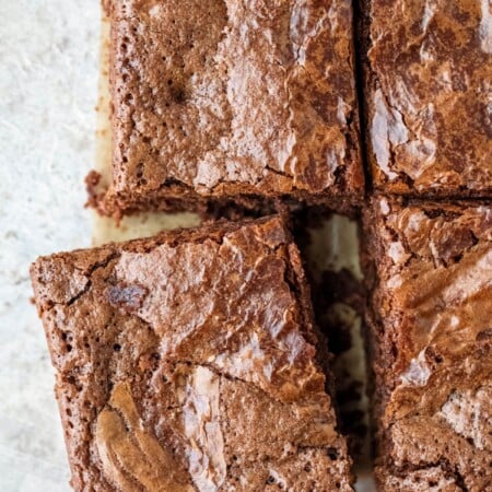 One brownie cut and slightly pulled away from the rest of the brownies