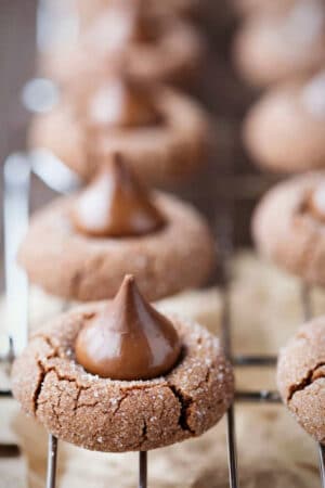 Chocolate kiss cookies on a wire cooling rack