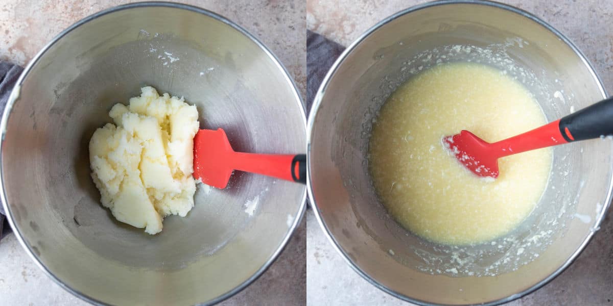 Creamed butter in a silver mixing bowl.