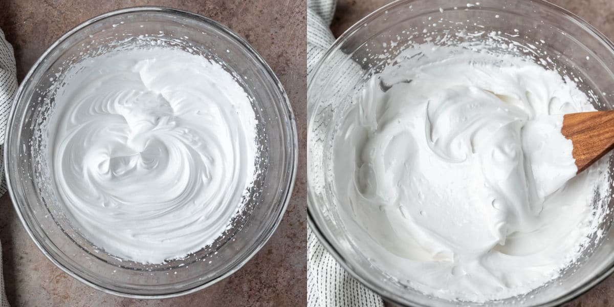 Whipped egg whites in a glass mixing bowl. 