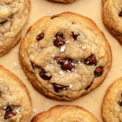 Rows of brown butter chocolate chip cookies sprinkled with sea salt.