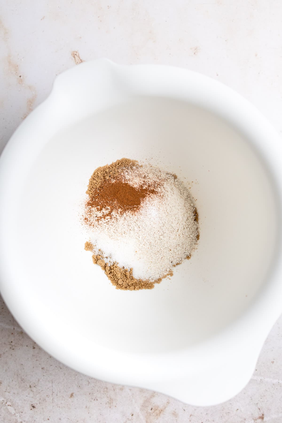 Ingredients for crisp topping in a white mixing bowl.