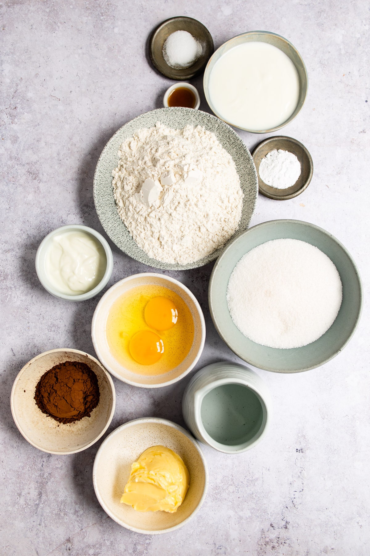 Ingredients for rocky road sheet cake in bowls.