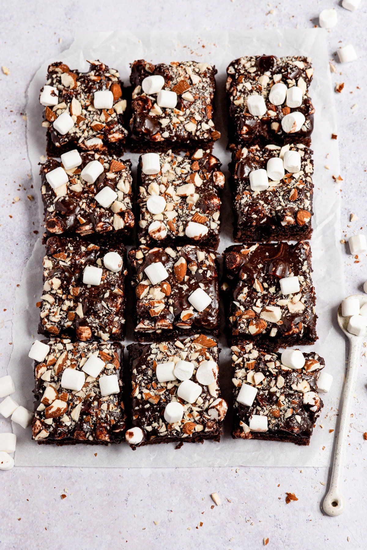 Rocky road sheet cake cut into slices. 