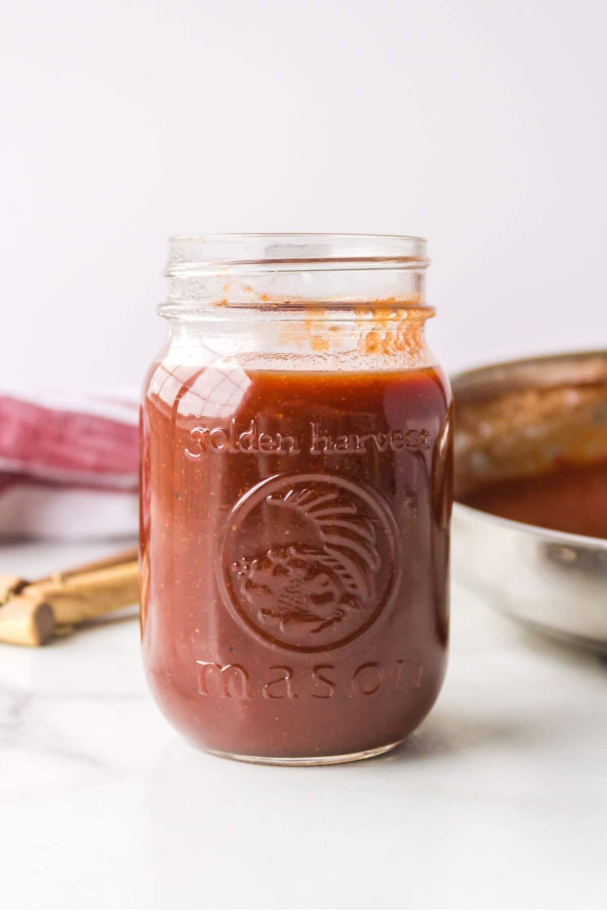 Dr Pepper barbecue sauce in a glass jar.