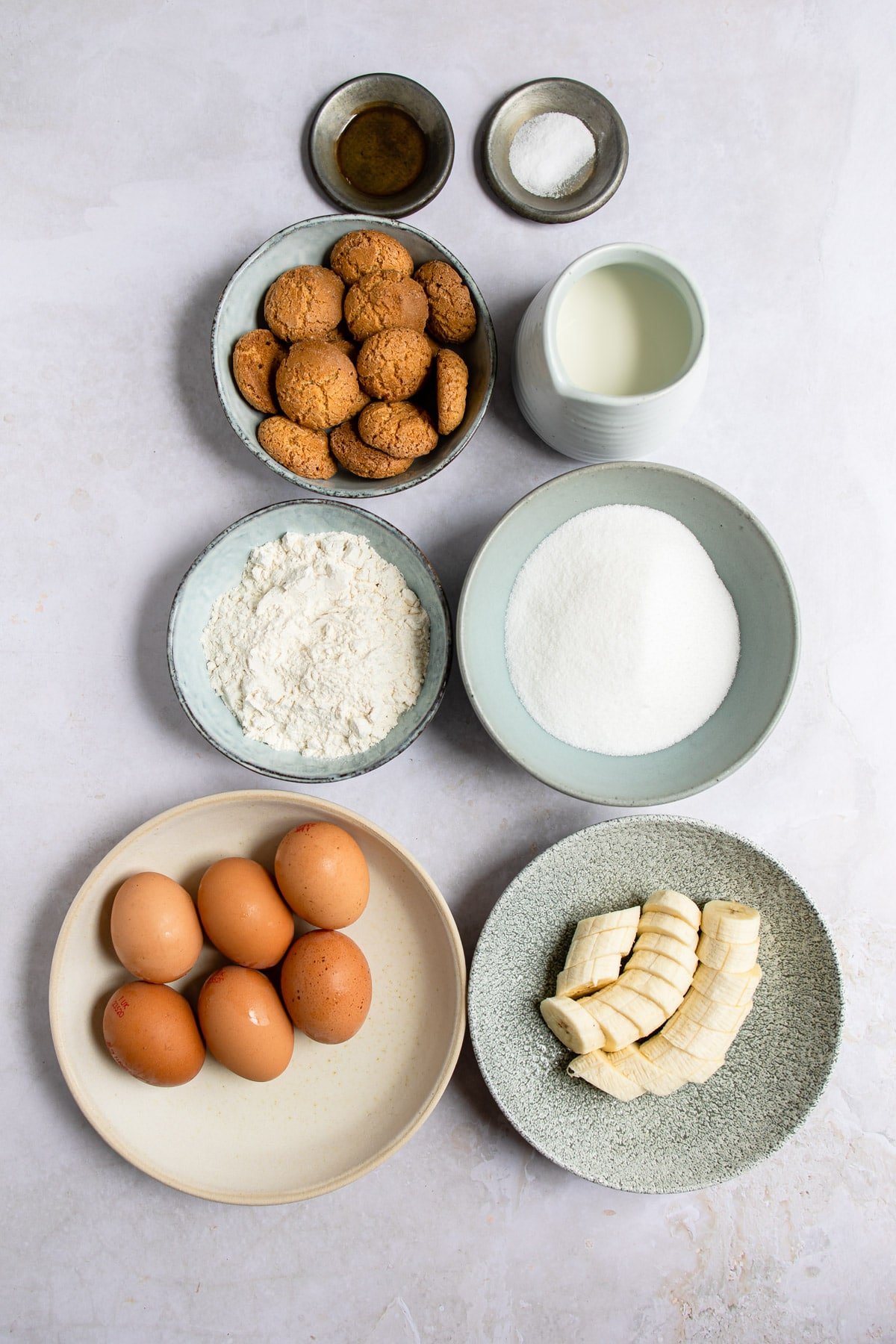 Ingredients for banana pudding in dishes. 