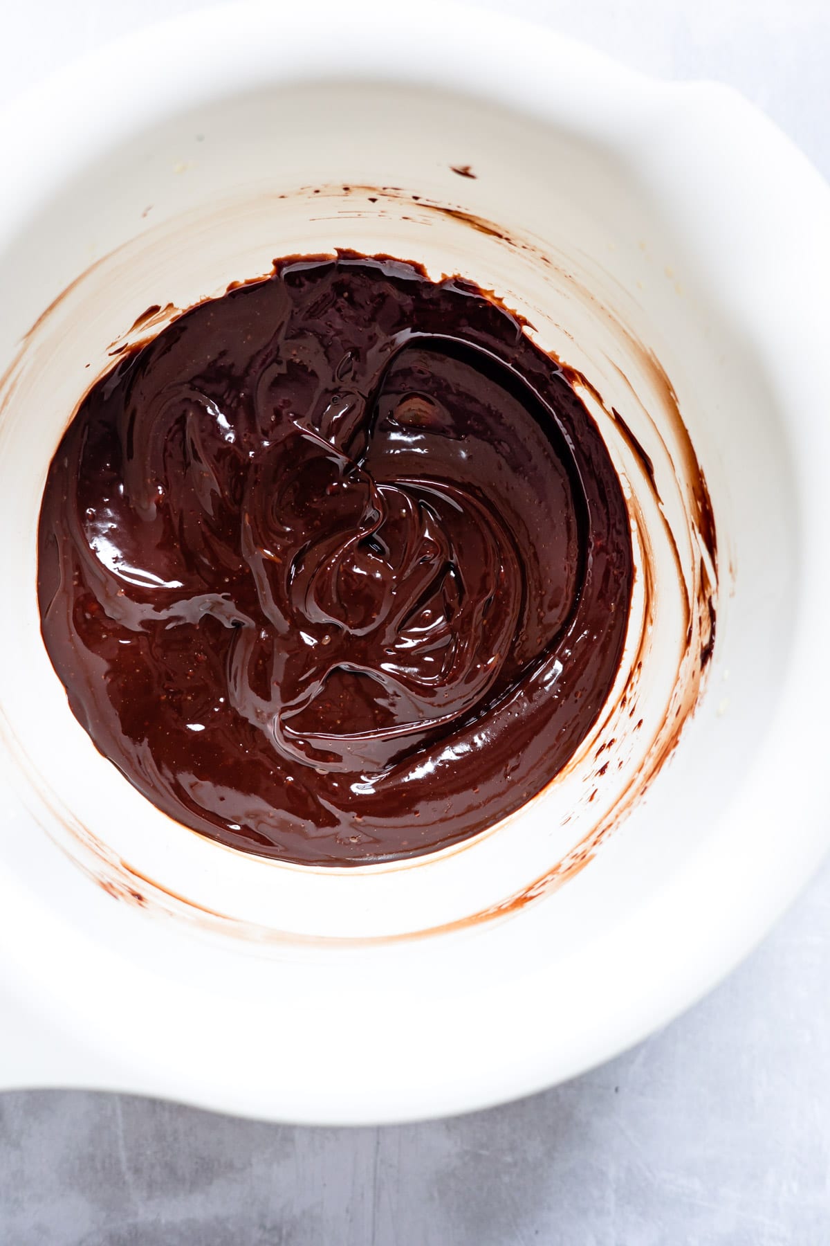 Chocolate ganache in a mixing bowl. 