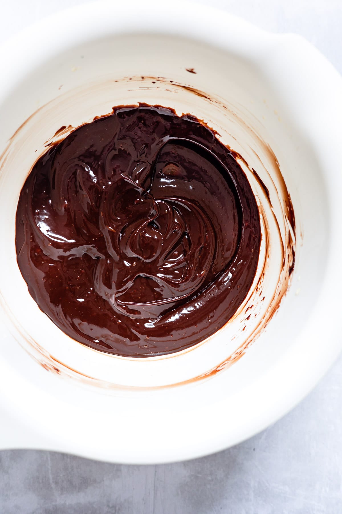 Chocolate ganache in a mixing bowl.
