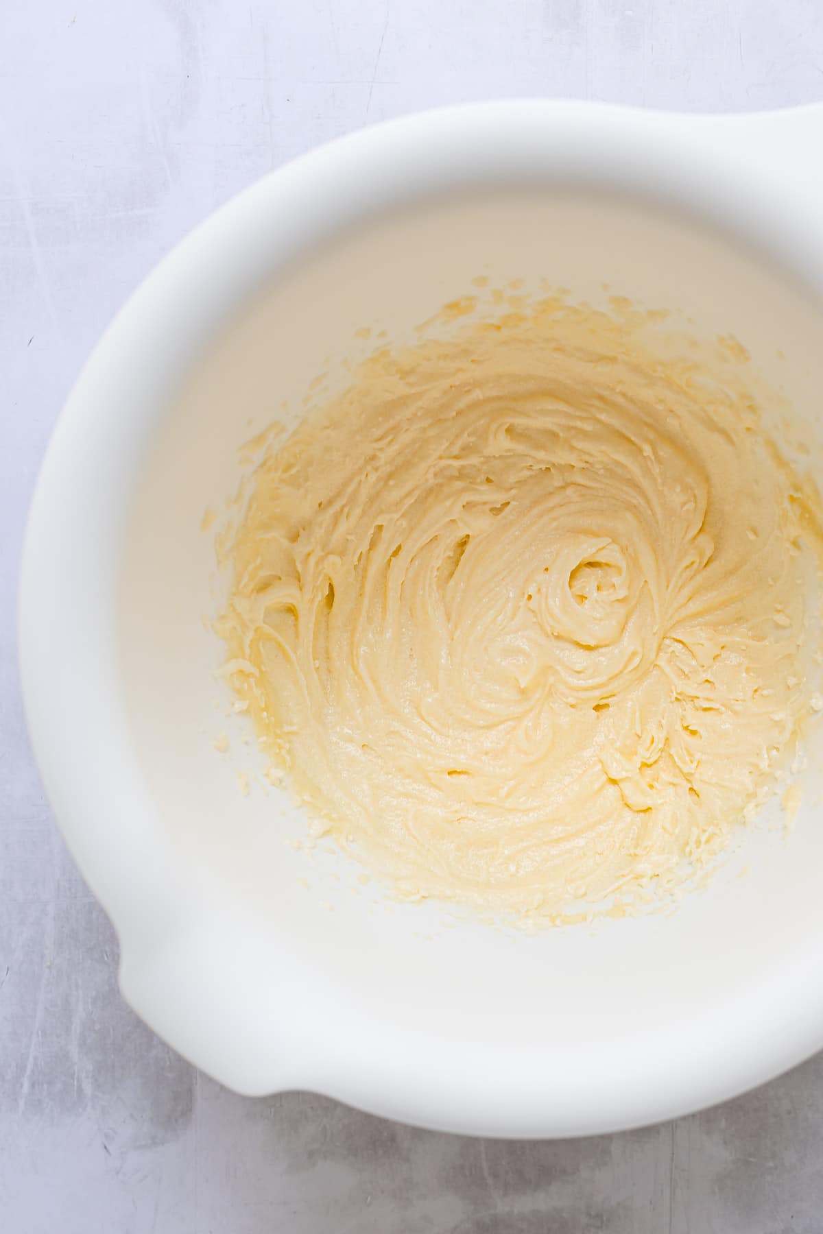 Cupcake batter in a mixing bowl. 