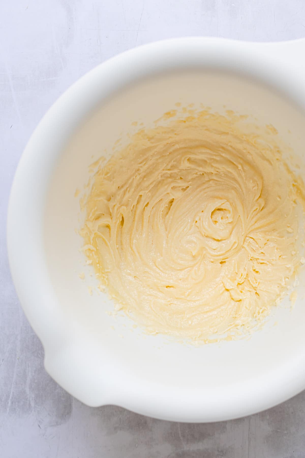 Cupcake batter in a mixing bowl.