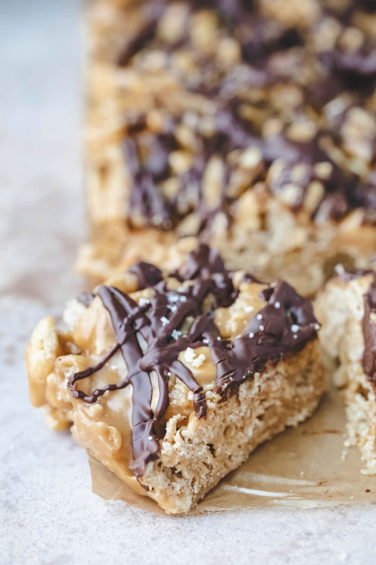 Chocolate peanut butter chex bar topped with sea salt.