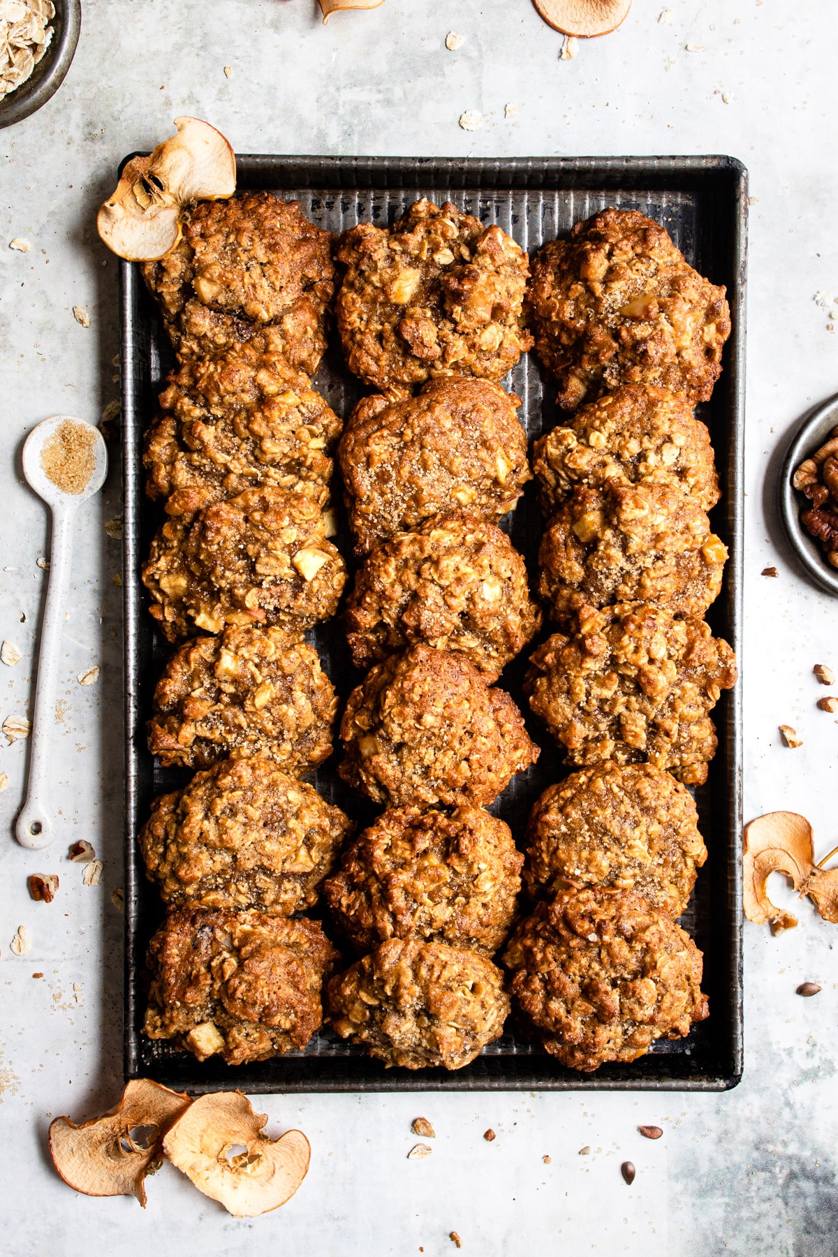 Baking tray filled with apple crisp cookies.