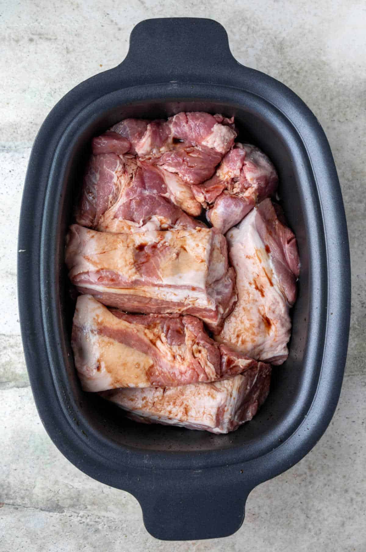 Pieces of pork roast coated with liquid smoke. 