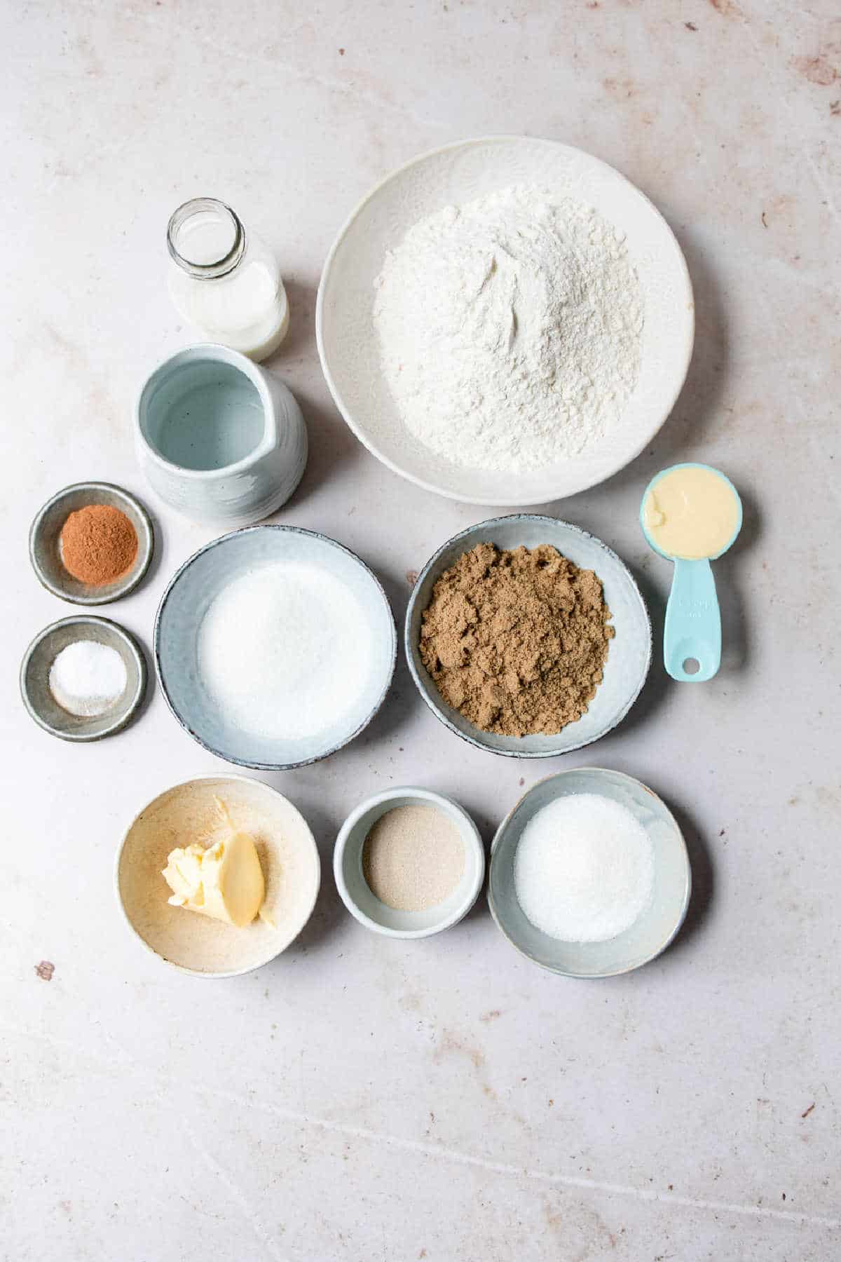 Ingredients for cinnamon twist bread in dishes. 