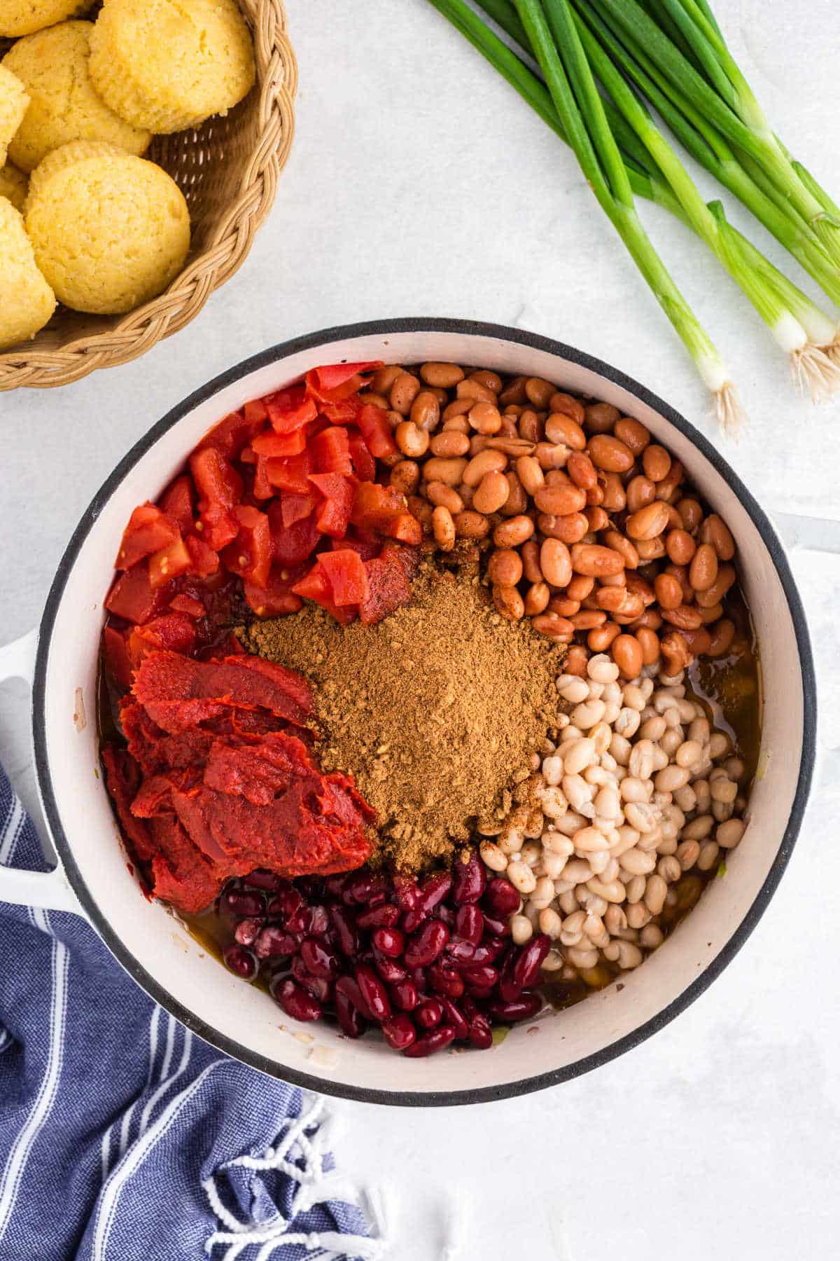 Chili ingredients in a Dutch oven.