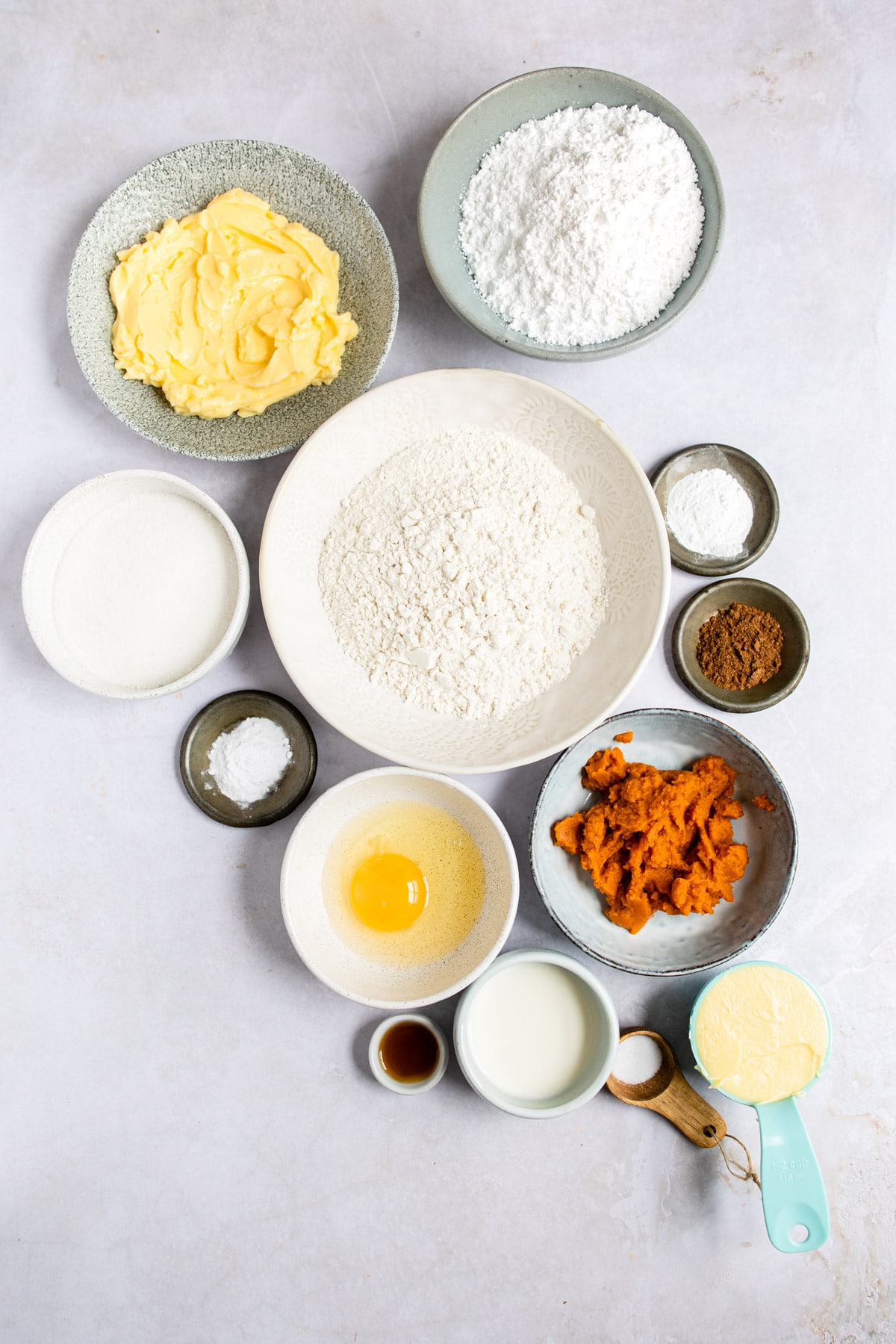 Ingredients for pumpkin cookies in dishes.