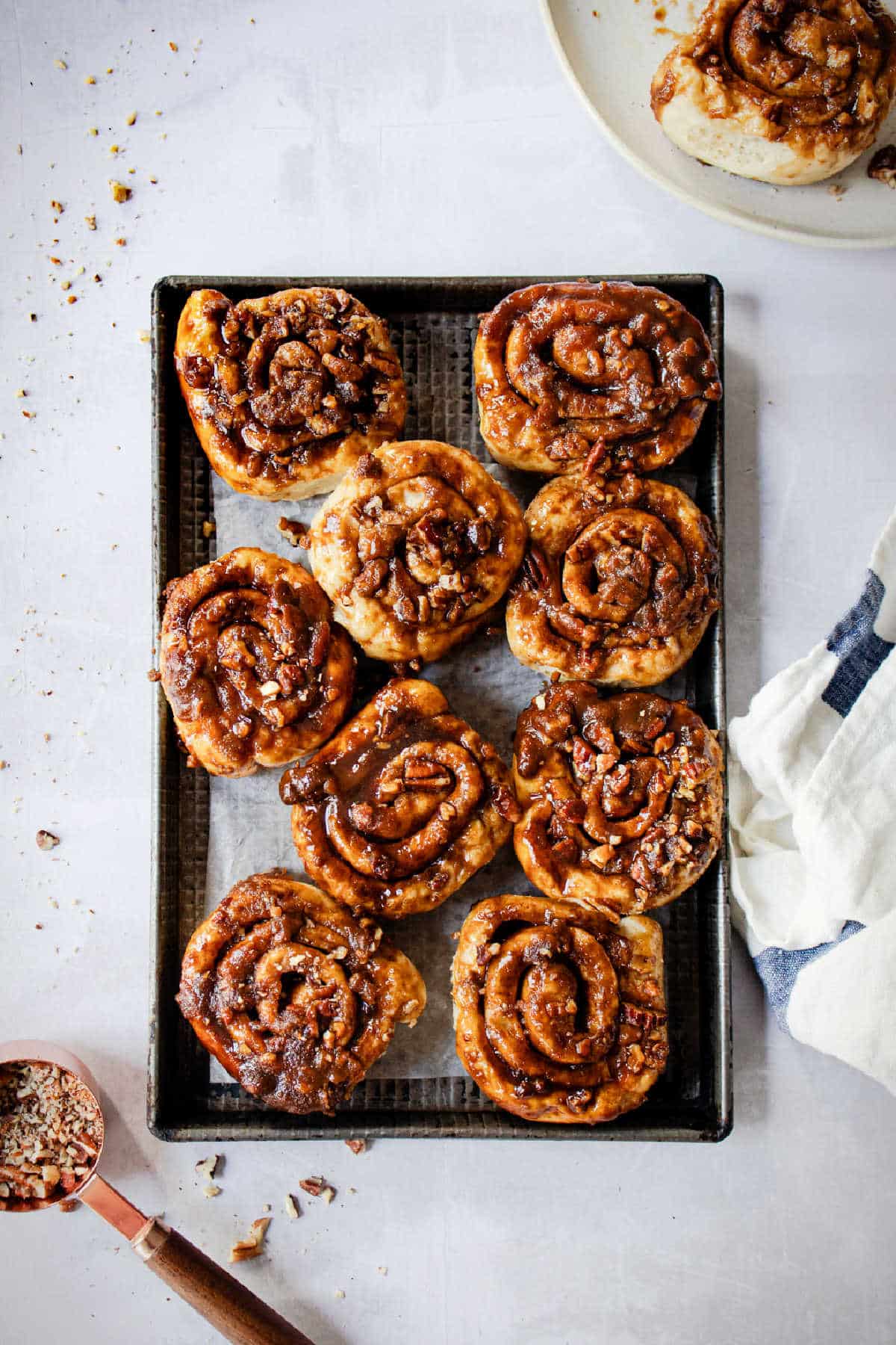 A tray of homemade caramel rolls. 