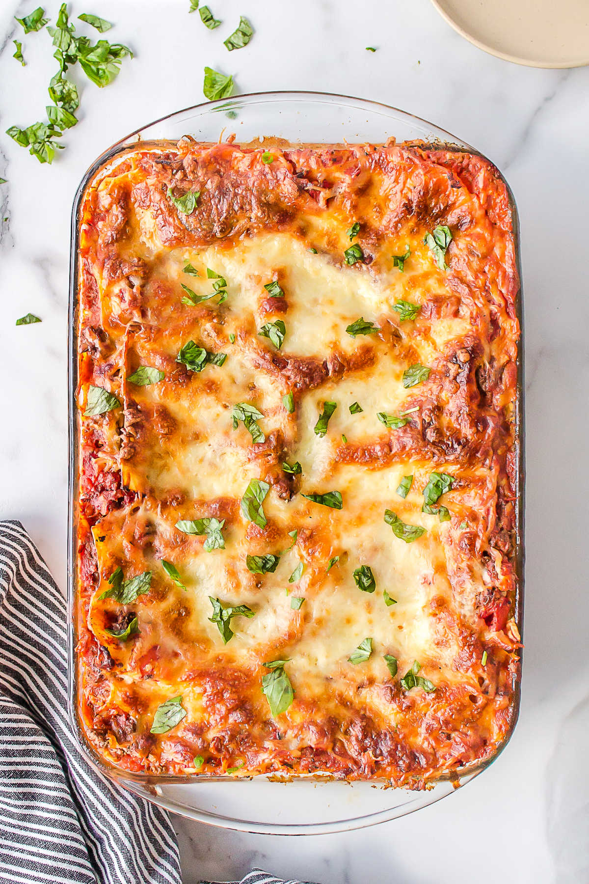 Baked freezer lasagna in a pan.