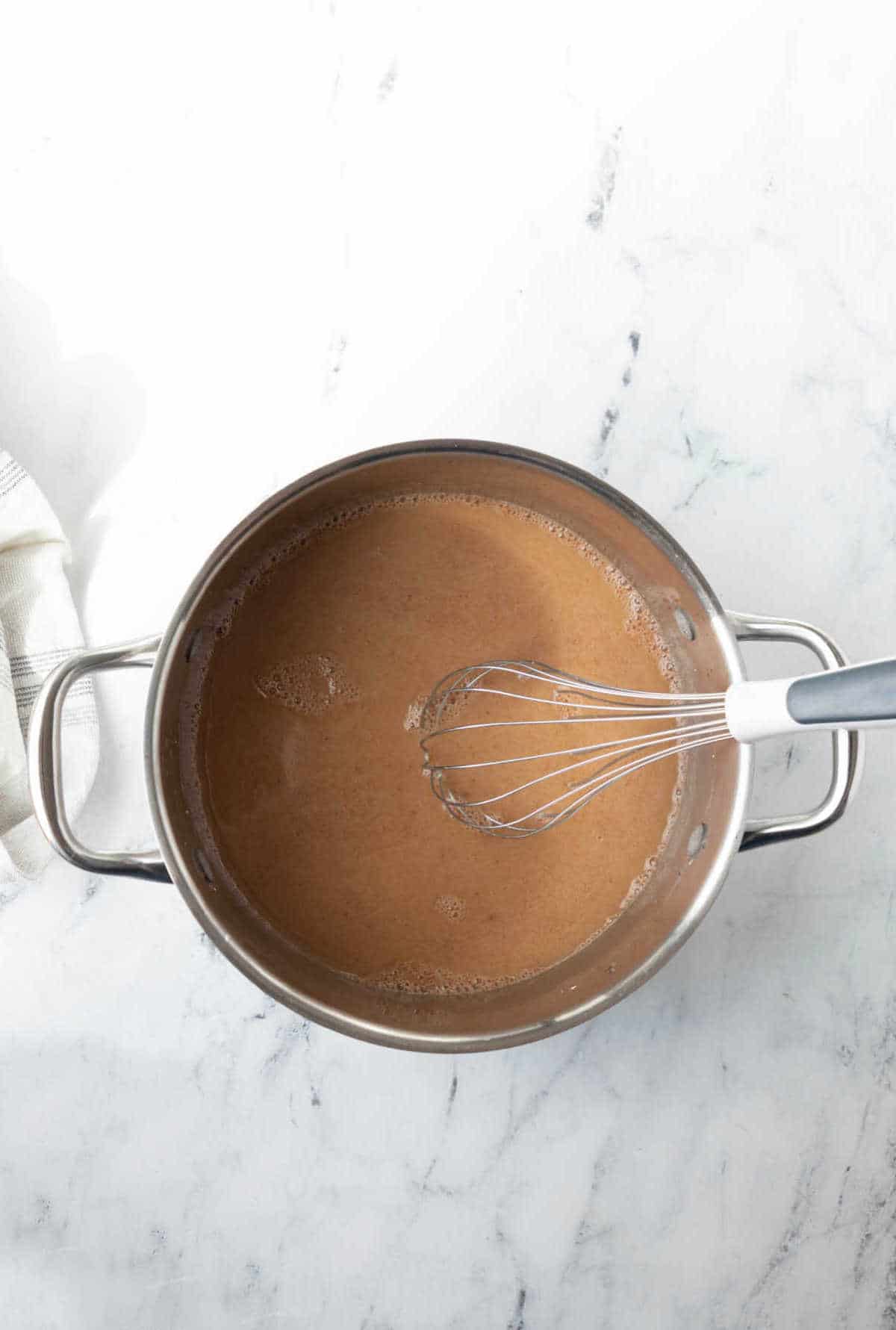 Apple pie filling goo ingredients in a pot. 