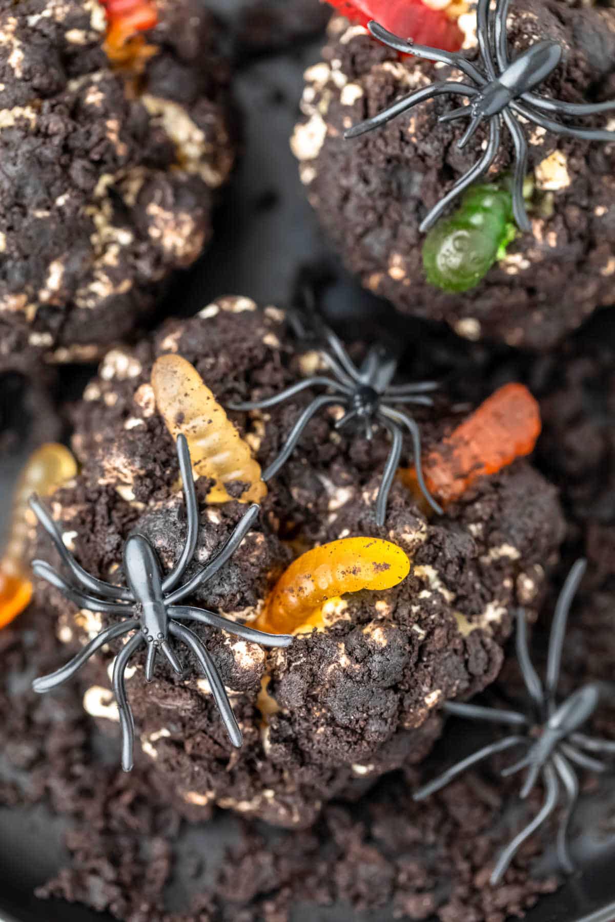 Dirt balls on a black plate. 