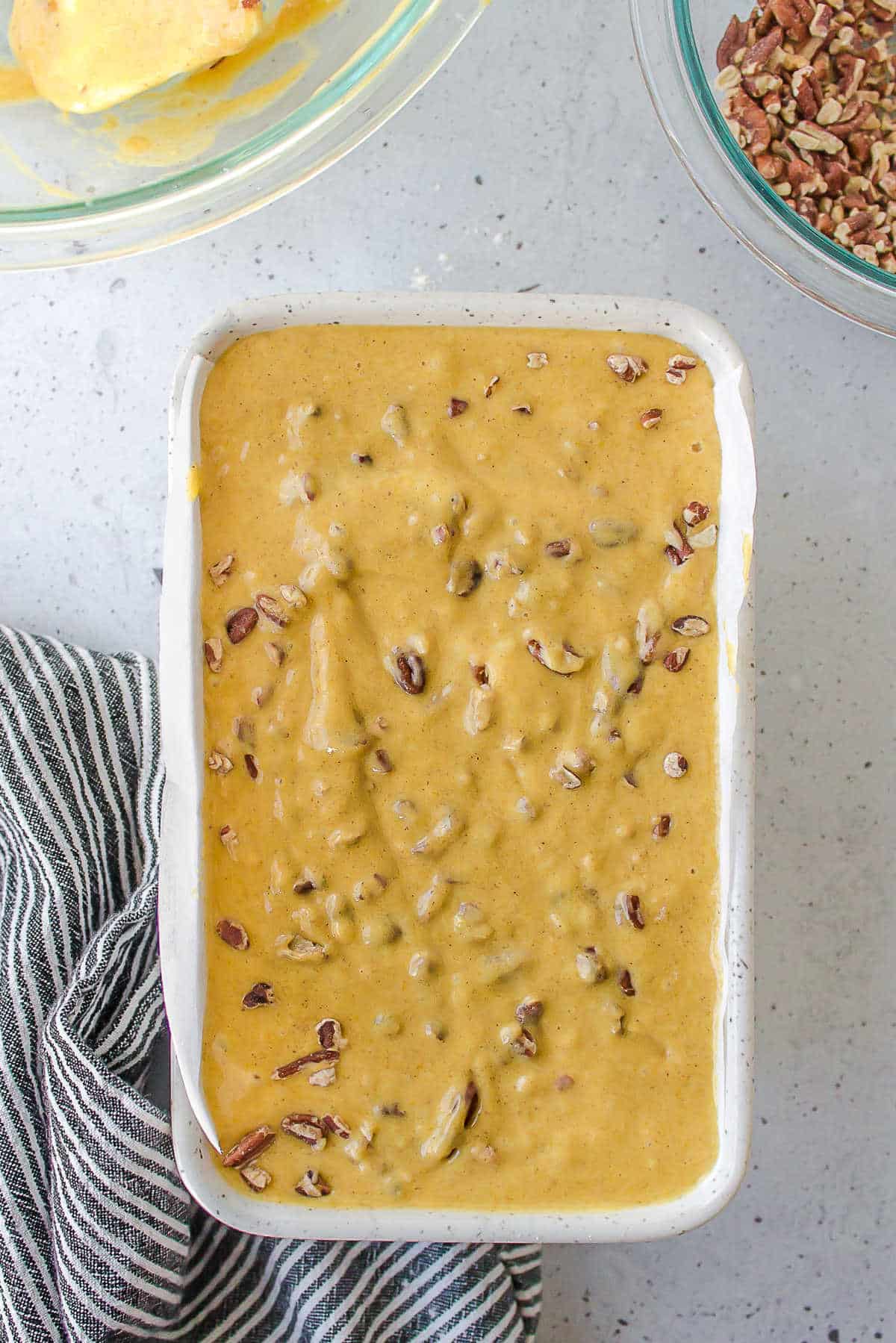 Pumpkin bread batter in a loaf pan.