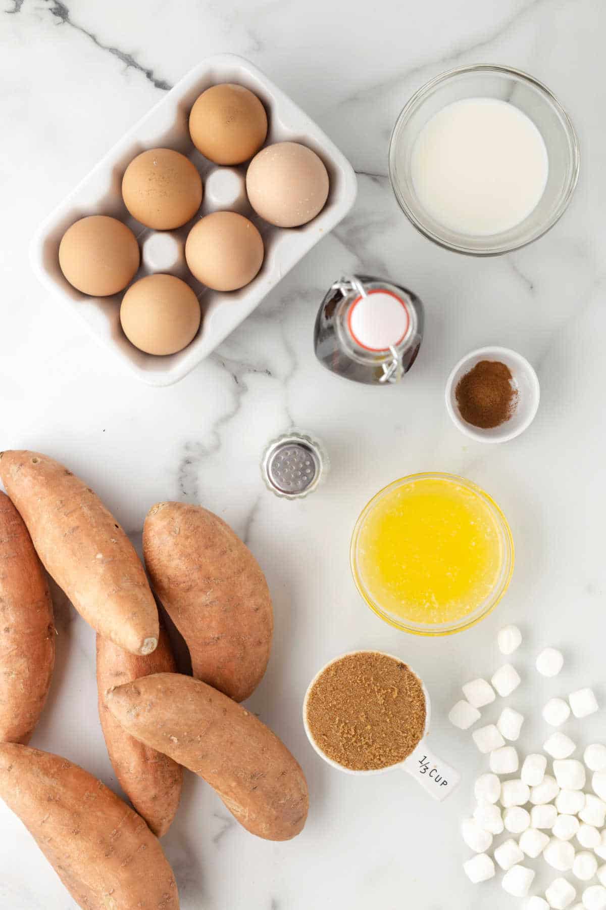 Ingredients for sweet potato casserole in dishes. 