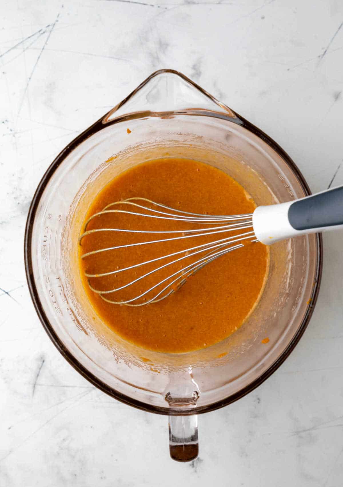 Pumpkin puree mixed into egg and sugar mixture. 