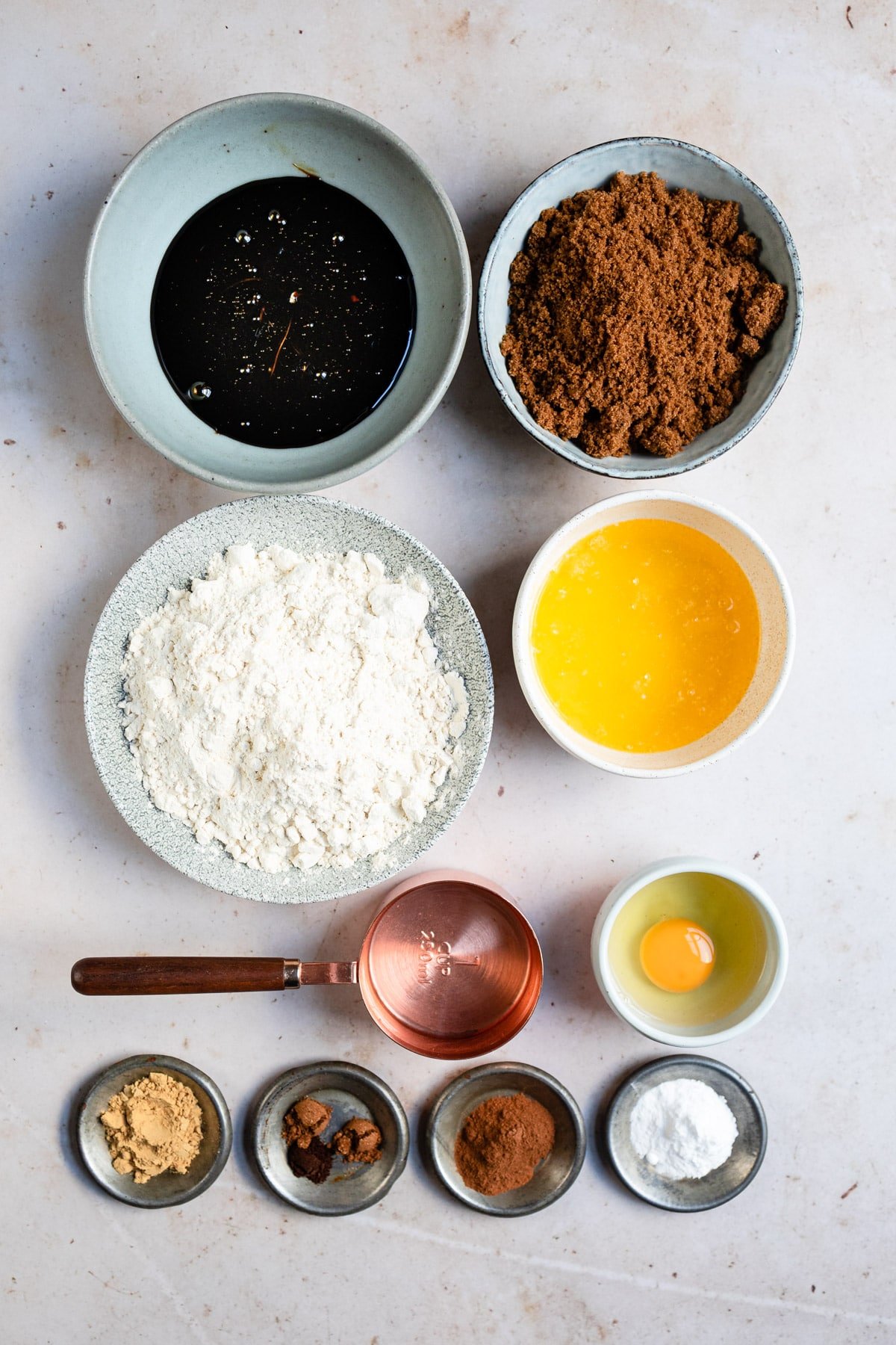 Ingredients for gingerbread in bowls. 