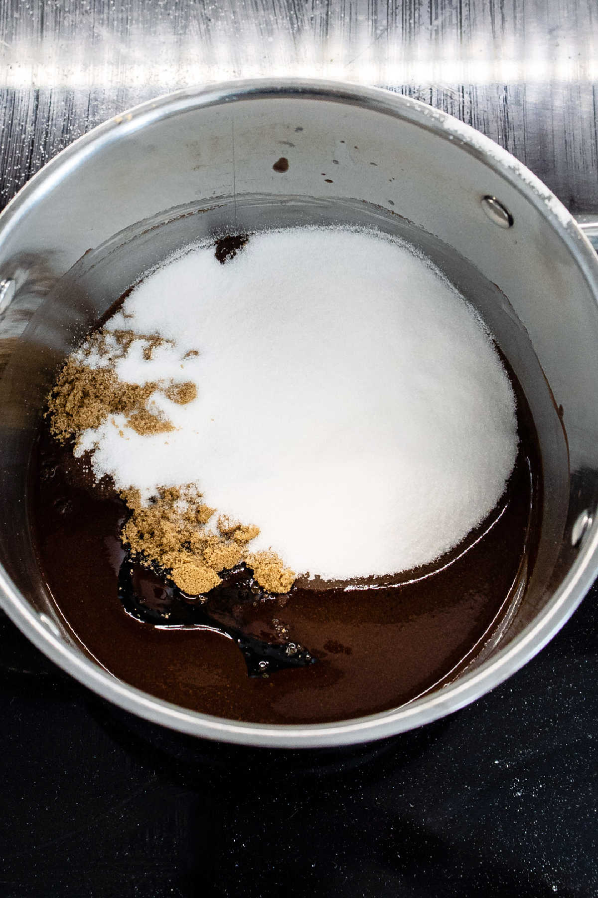 Sugars in melted butter and chocolate.