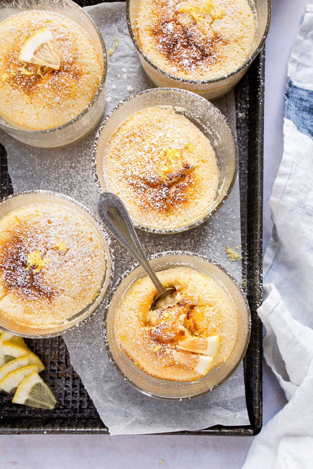 A silver spoon in a lemon pudding cake.