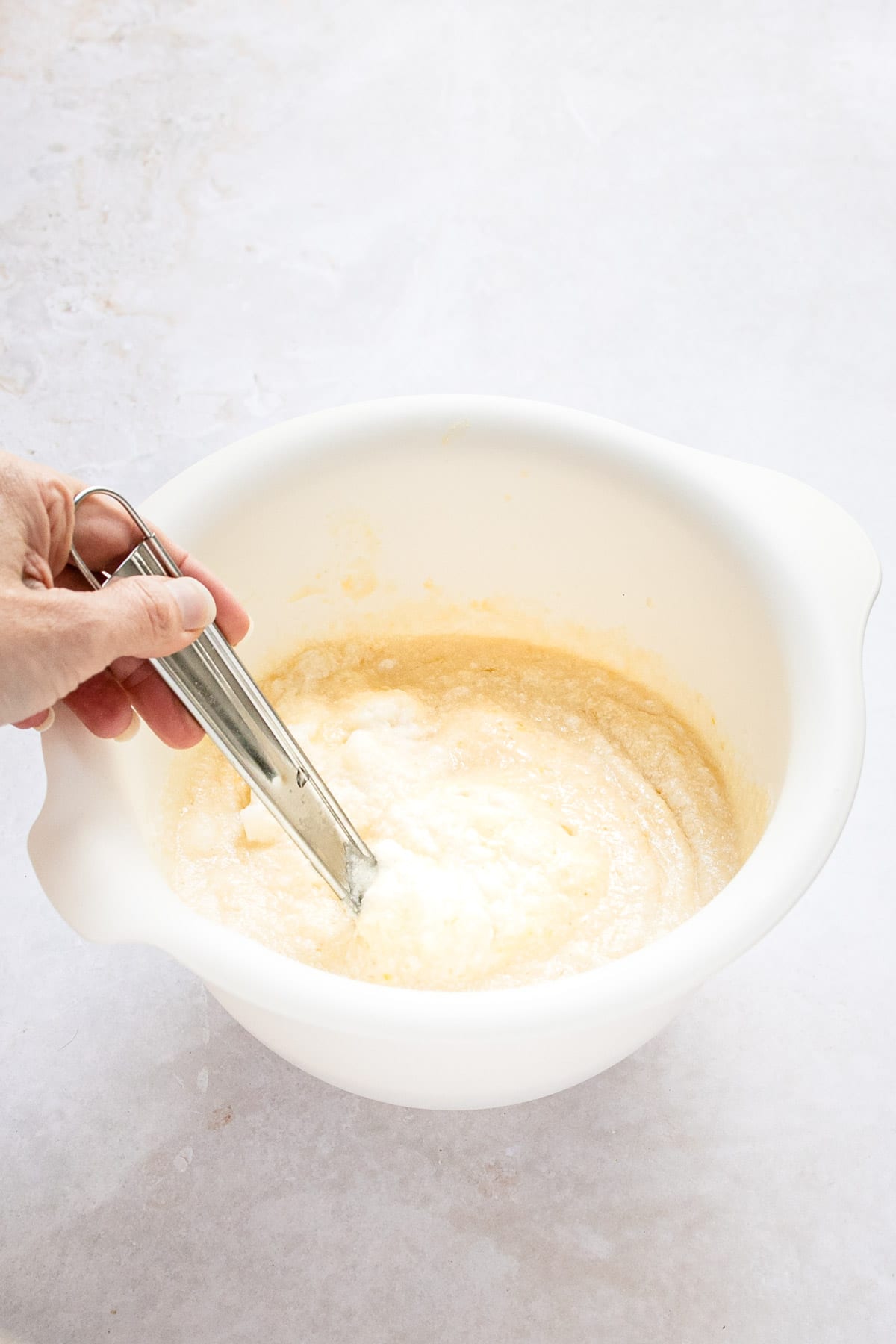 Egg whites being folded in batter. 