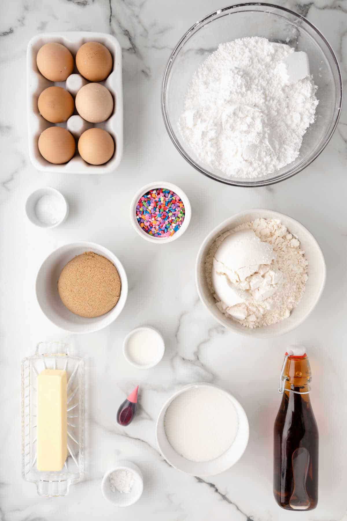 Ingredients for sugar cookie bars in dishes. 