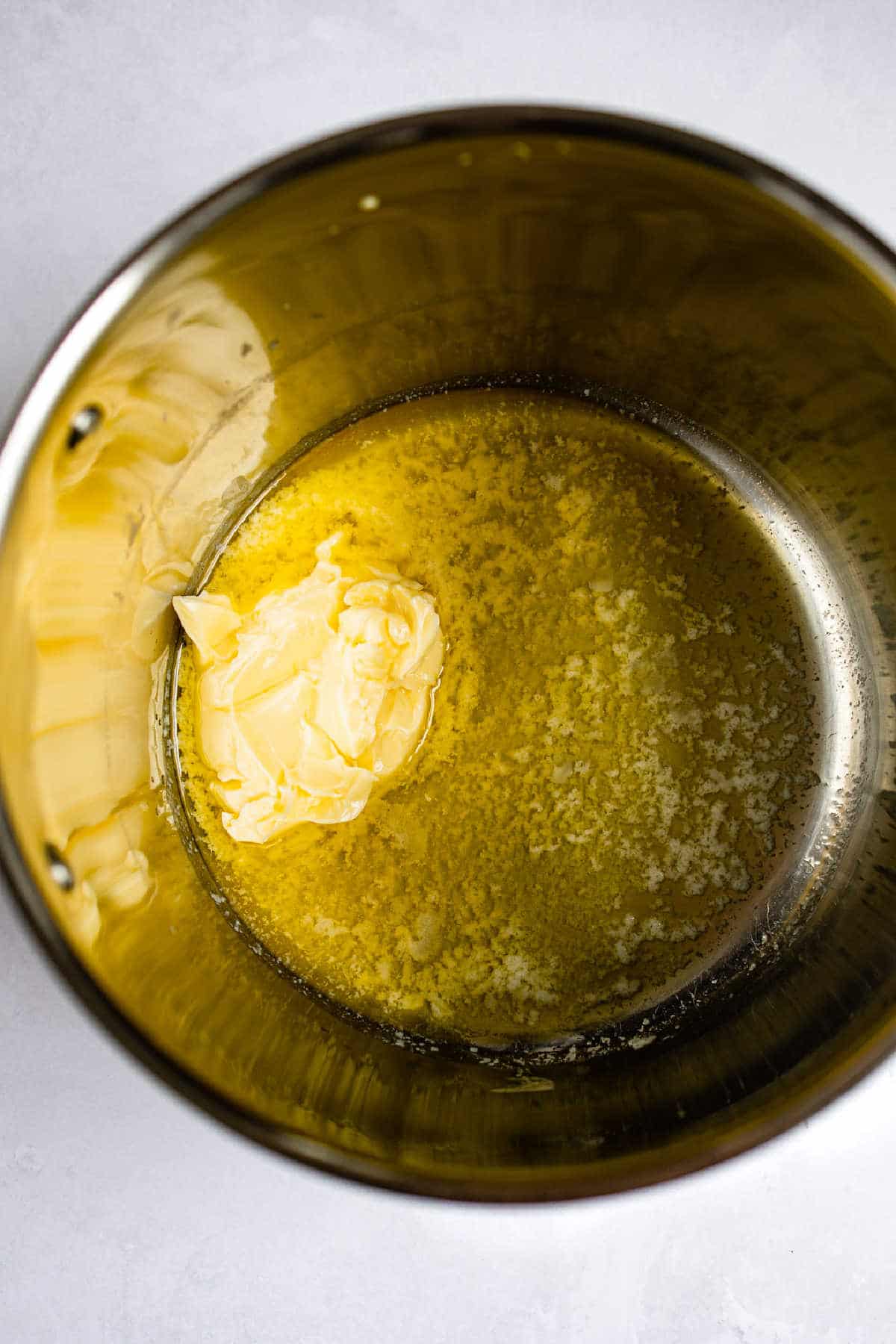 Butter melting in a saucepan.