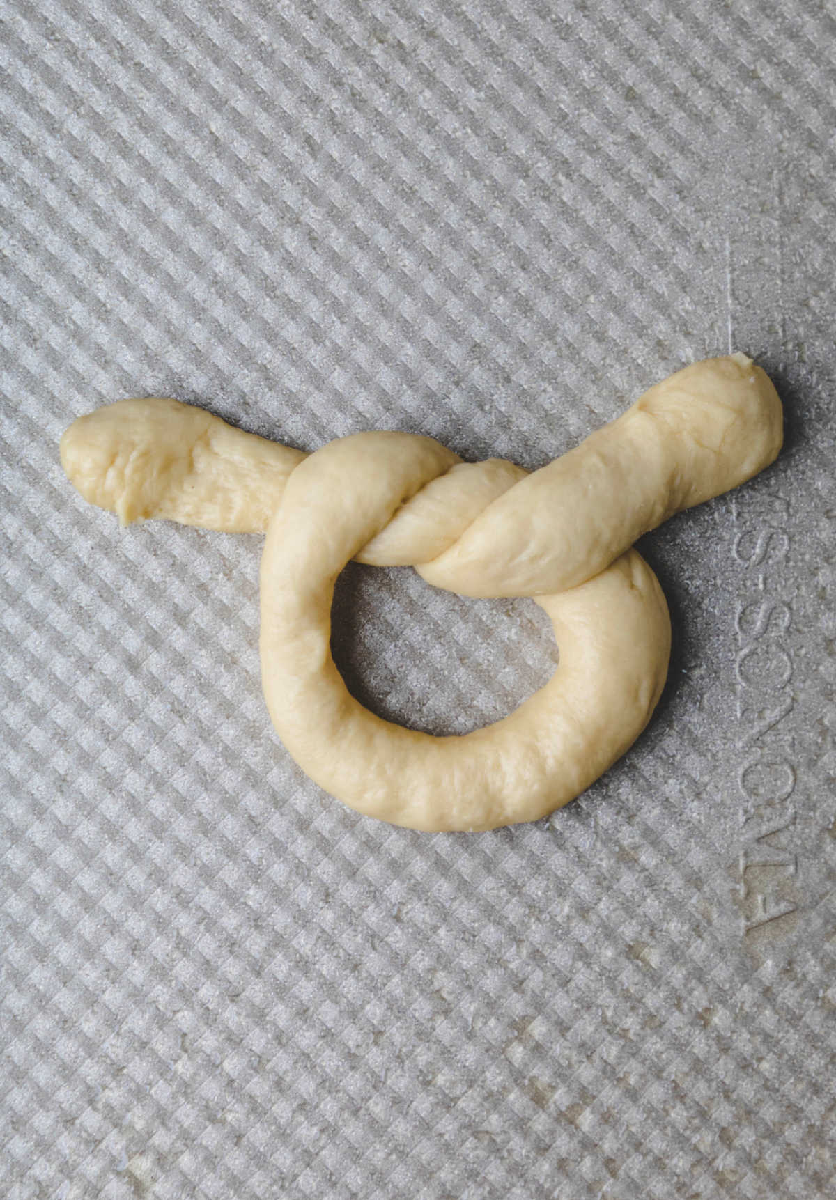 A piece of dough tied in a loose knot. 