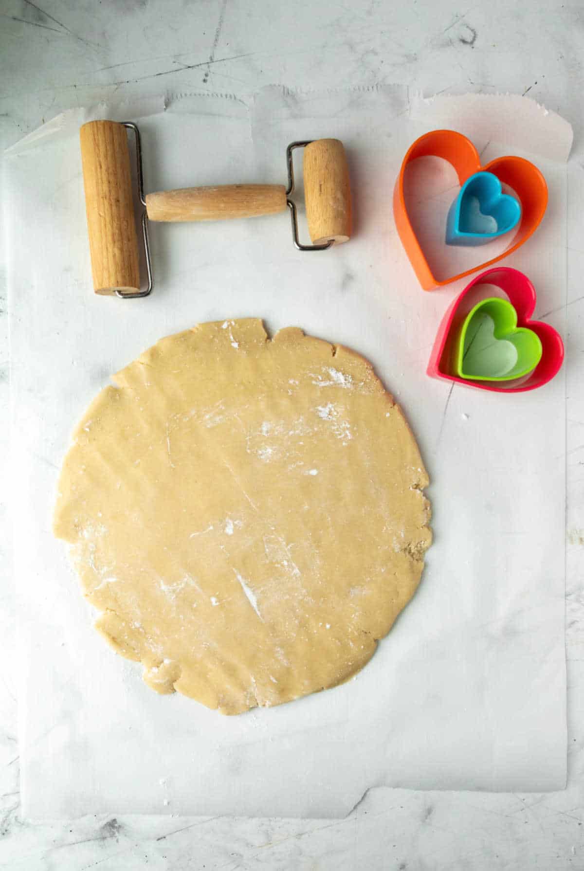 Sugar cookie dough on a floured surface. 