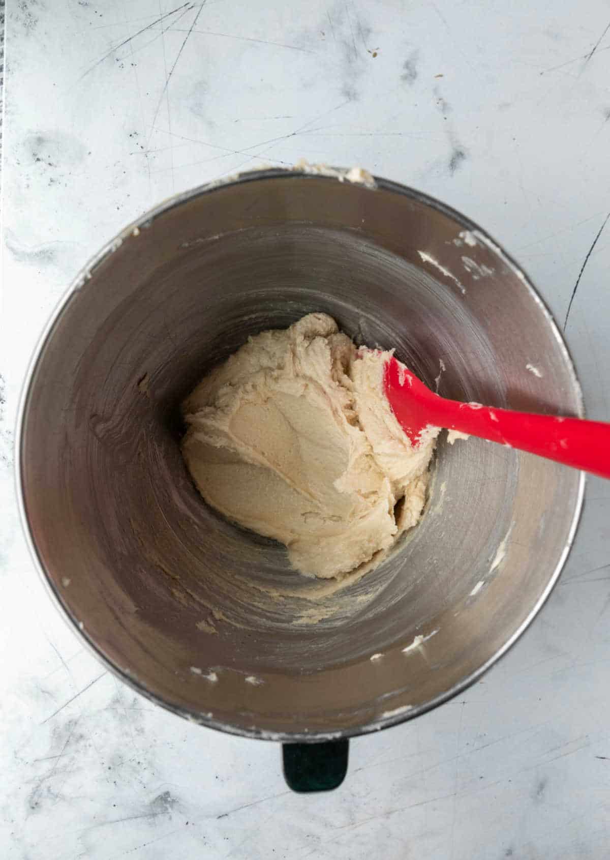 Creamed butter with extracts and egg mixed in.