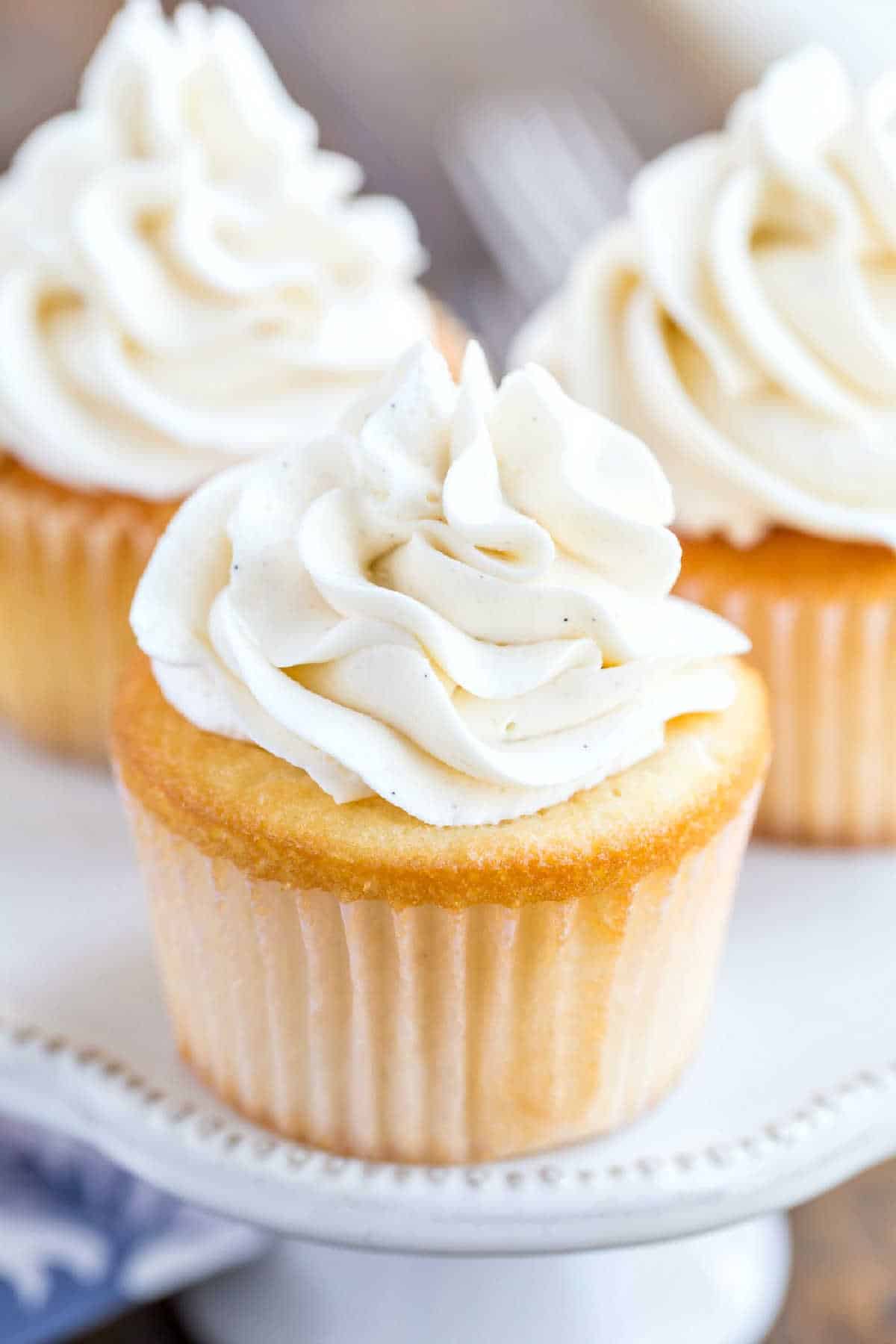 White cupcake topped with frosting made without powdered sugar. 