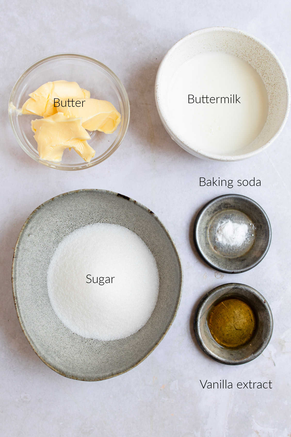 Ingredients for buttermilk glaze in dishes with labels.