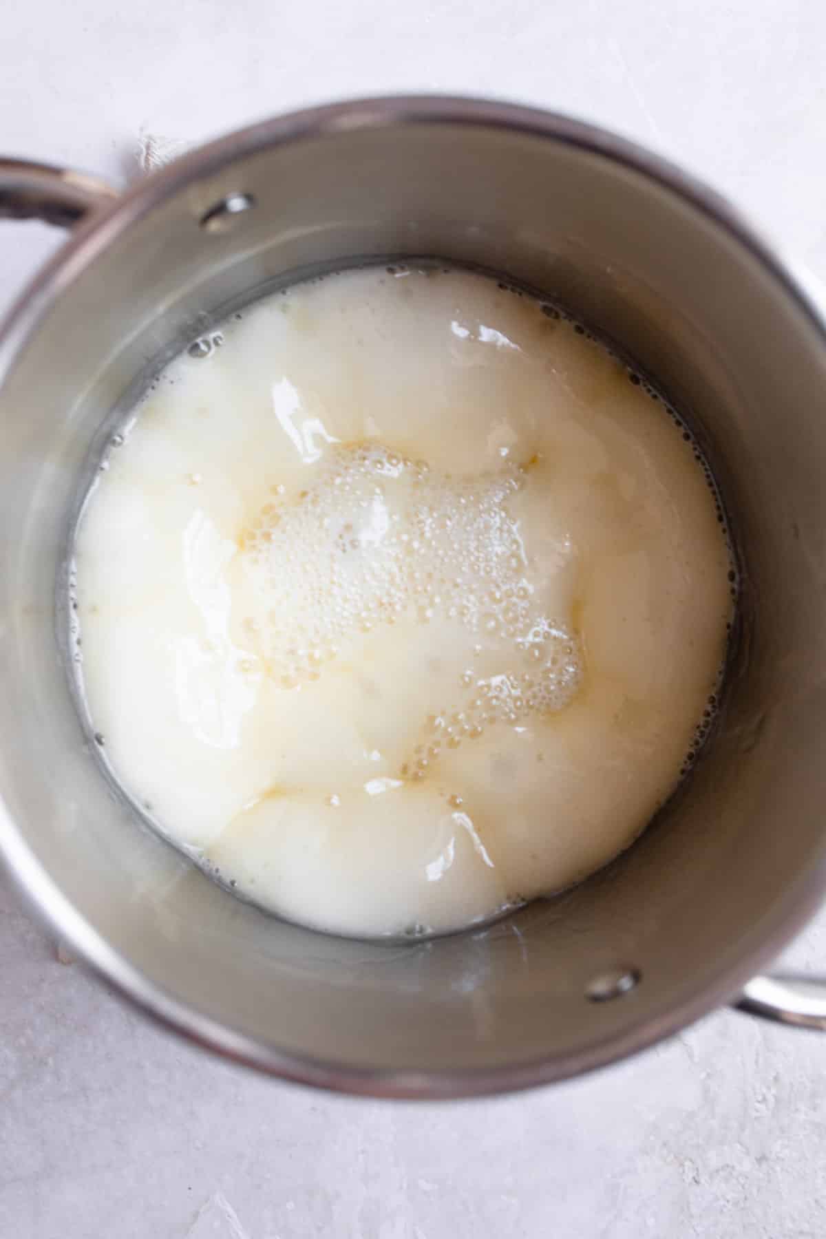 Ingredients for buttermilk glaze in a pot.
