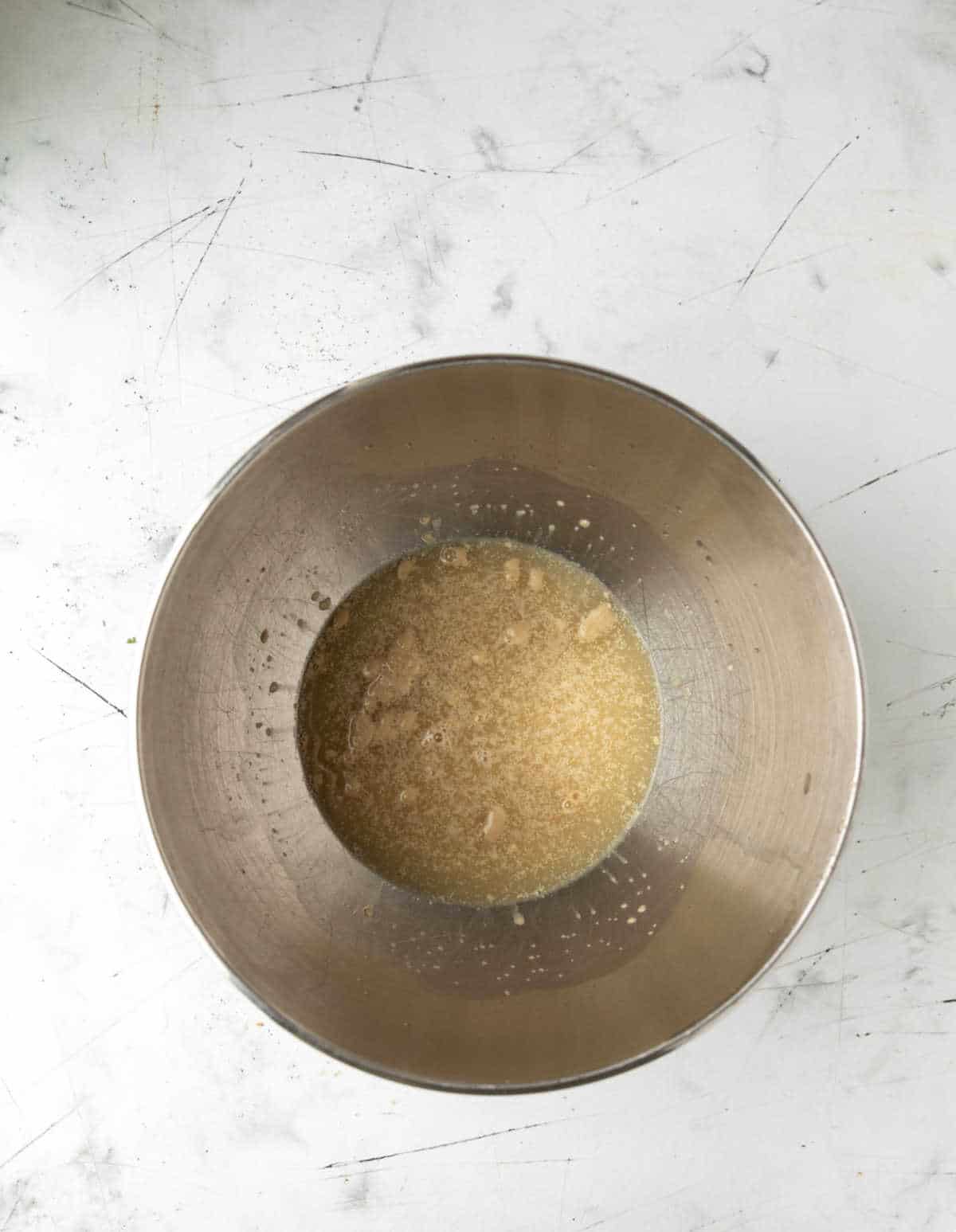 Yeast proofing in a mixing bowl. 