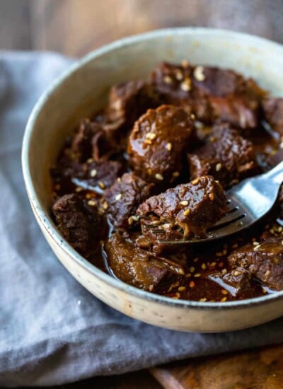 Instant Pot Korean Beef in a bowl with a fork