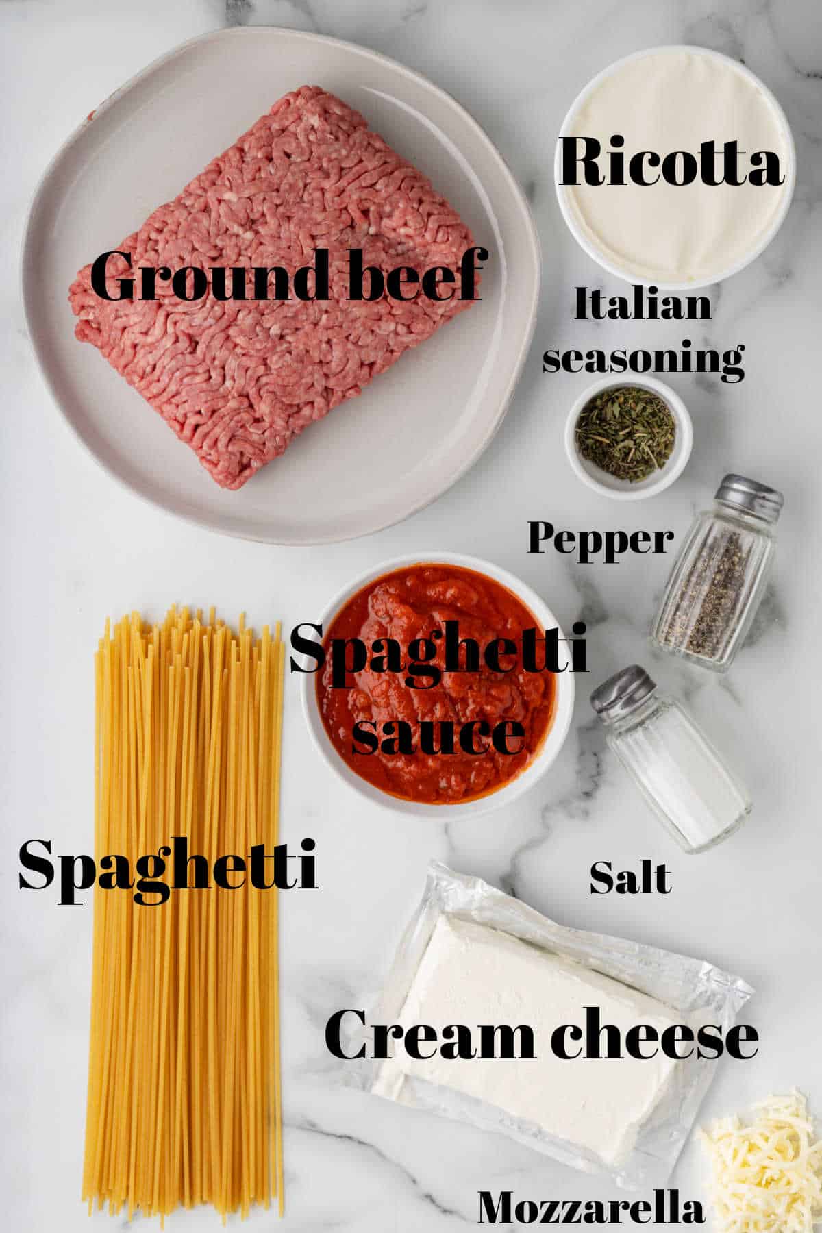 Ingredients for million dollar spaghetti in dishes with labels.